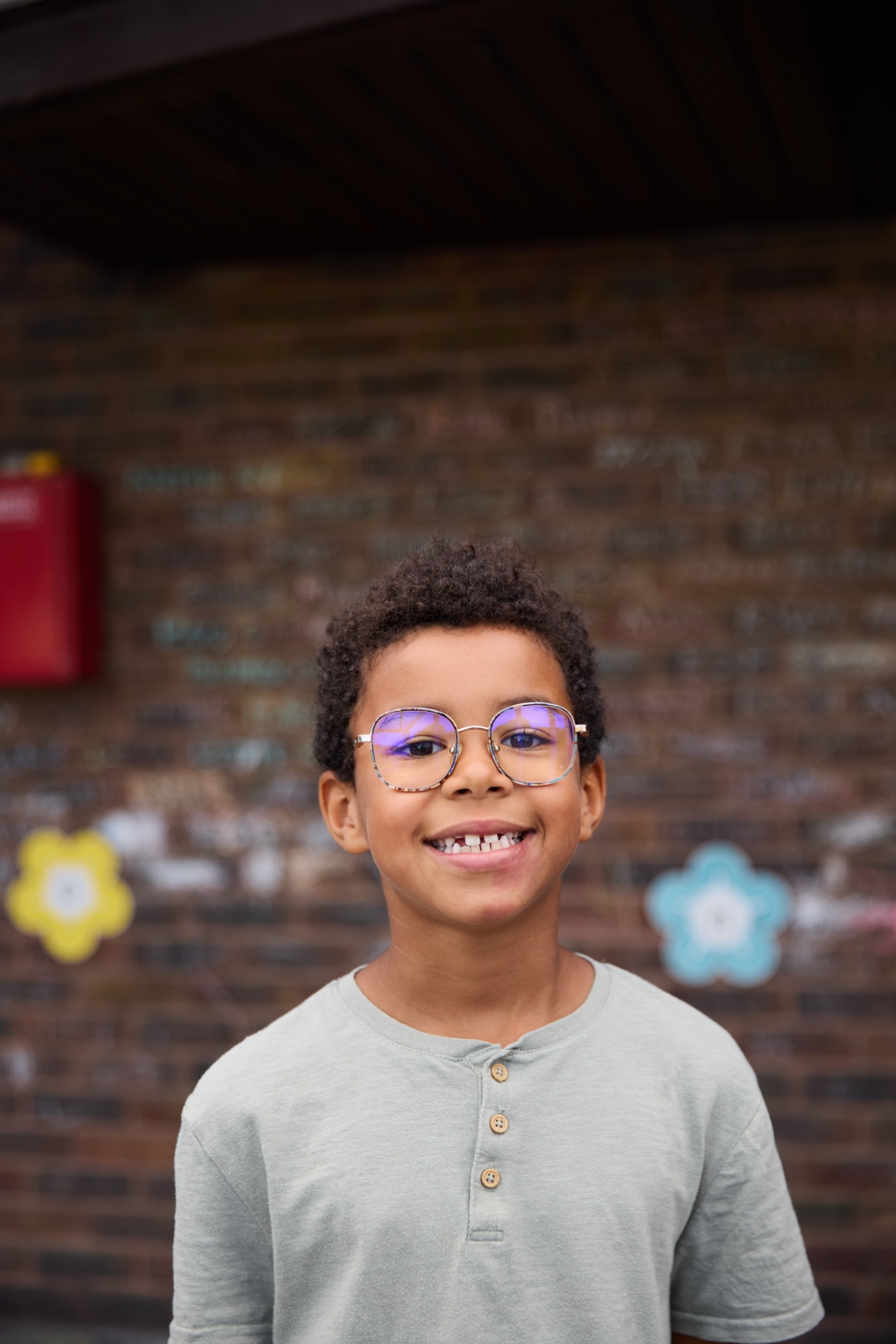 Boy smiling on arrival at camp